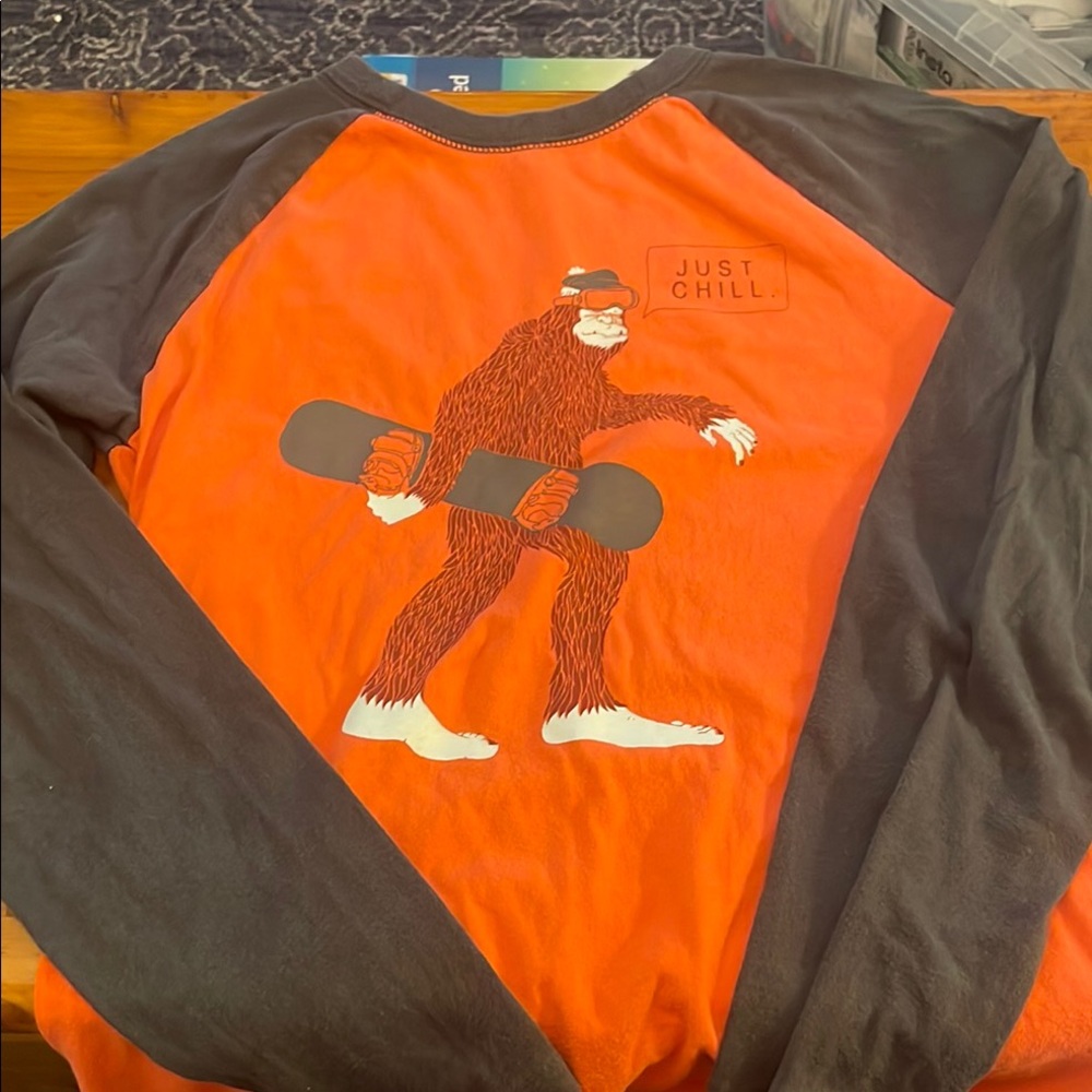 Orange and Black Long Sleeve Shirt with Bigfoot Graphic